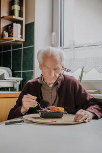 Man sitting on table