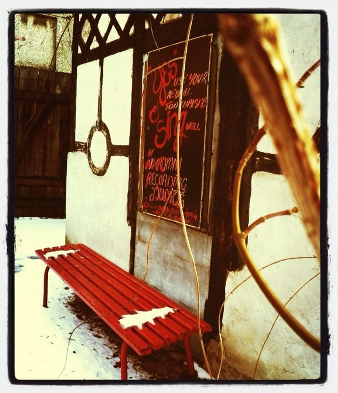 transfer print, auto post production filter, red, hanging, chair, metal, day, wood - material, absence, built structure, no people, outdoors, close-up, protection, sunlight, bench, table, metallic, drying, architecture