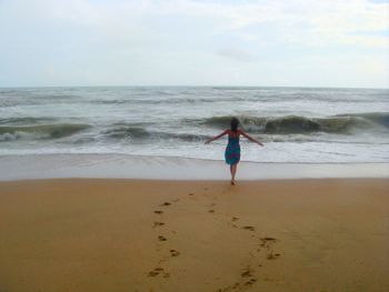Scenic view of beach against sky