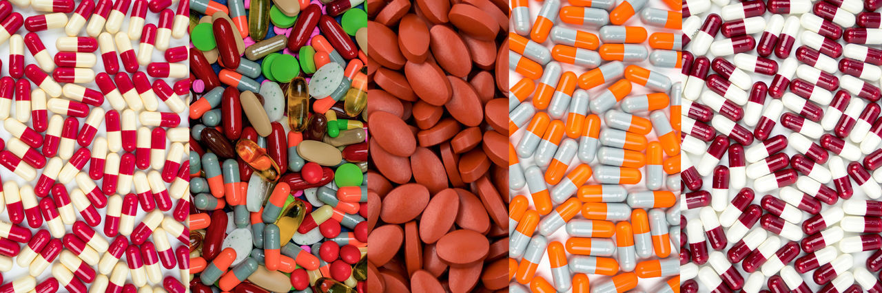 HIGH ANGLE VIEW OF MULTI COLORED CANDIES FOR SALE AT MARKET STALL