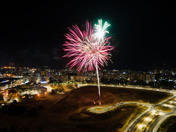 Firework display at night