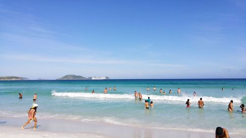 People enjoying at beach