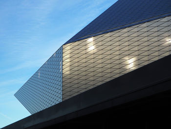 Low angle view of modern building against sky