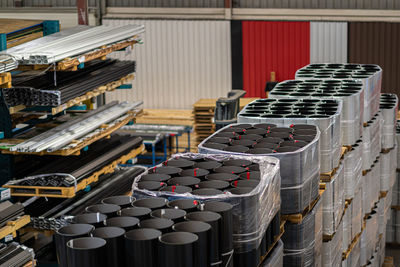 Stack of pipes in warehouse