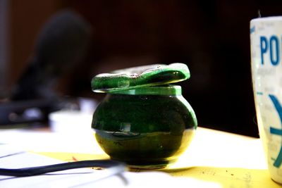 Close-up of drink in glass jar on table