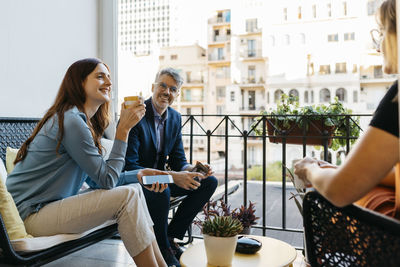 Group of people sitting on table