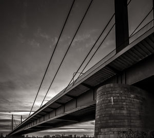 Low angle view of elevated road against sky