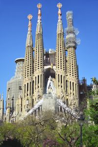 Low angle view of church against blue sky