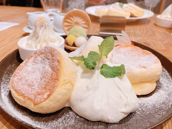 High angle view of dessert in plate on table at japanese cafe.