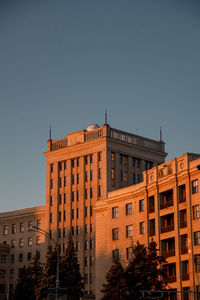 Low angle view of buildings against clear sky