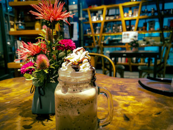 Close-up of flower vase on table