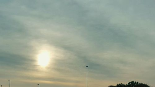 Low angle view of cloudy sky at sunset