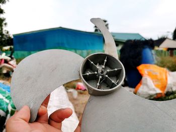 Close-up of hand holding ice cream