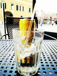 Close-up of beer glass on table