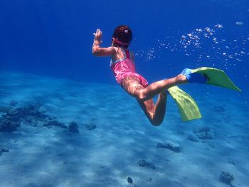 Girl swimming in sea