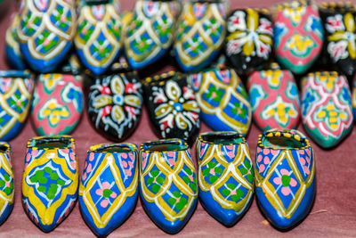 Close-up of multi colored objects for sale in market