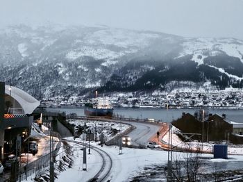 High angle view of cars on snow covered landscape