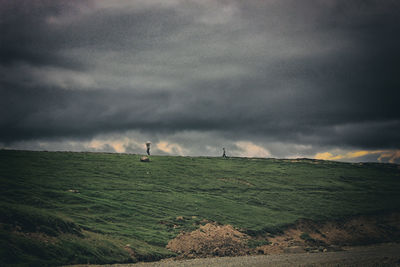 Scenic view of land against sky