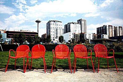 Empty chairs in park