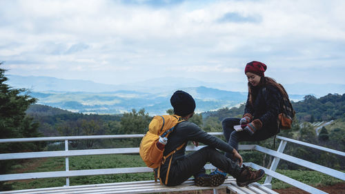 Couple siting on seat