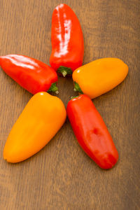 High angle view of red chili peppers on table