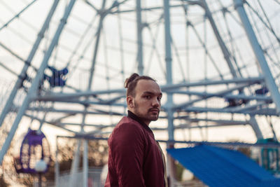 Portrait of young man standing outdoors