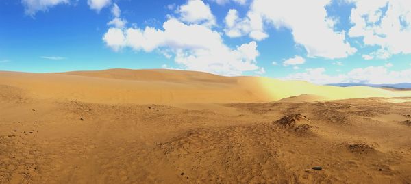 Scenic view of desert against sky