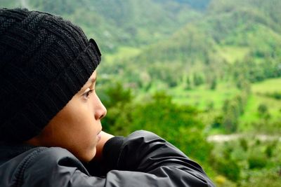 Close-up portrait of boy wearing hat