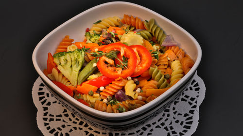 High angle view of chopped vegetables in bowl on table