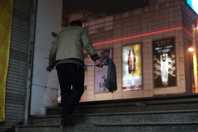 Full length of woman standing in city