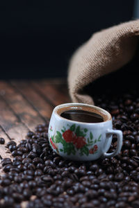 Close-up of coffee cup on table