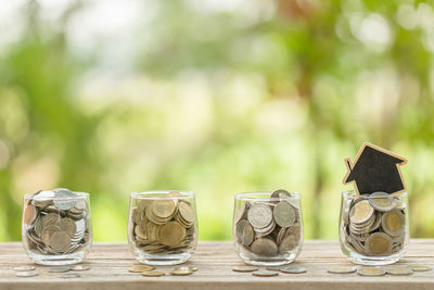 Close-up of coins on table