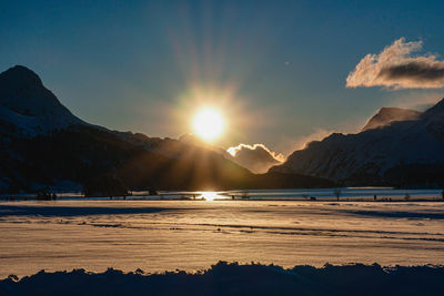 Scenic view of lake against sky during sunset, sils, switzerland
