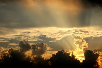 Scenic view of landscape against cloudy sky