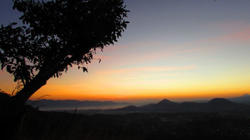 Scenic view of mountains at sunset