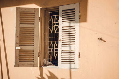 Close-up of window on wall of building