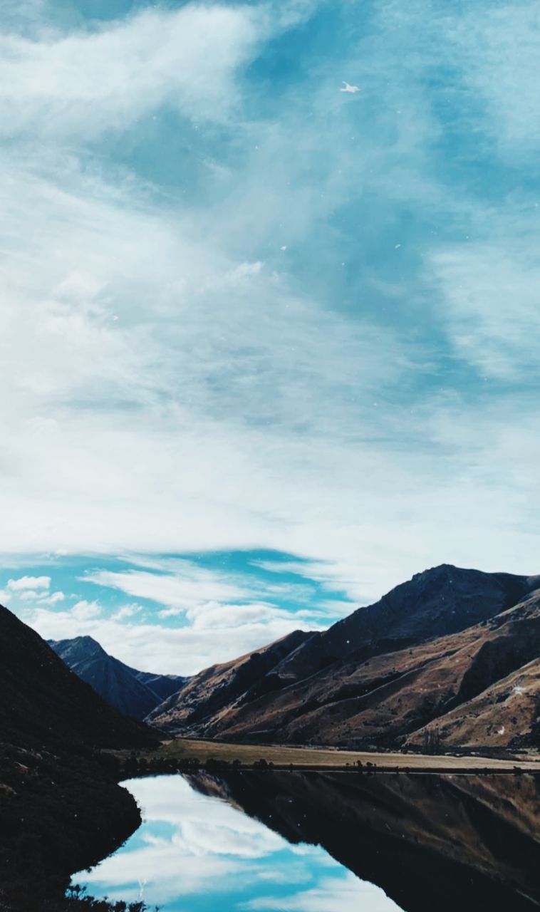 mountain, beauty in nature, cloud - sky, sky, scenics - nature, water, tranquility, tranquil scene, environment, mountain range, landscape, nature, non-urban scene, lake, day, idyllic, cold temperature, no people, outdoors, snowcapped mountain