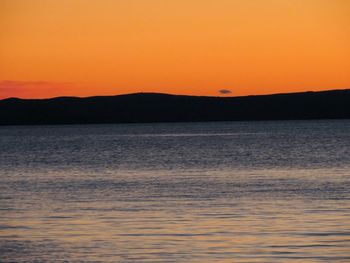 Scenic view of sea at sunset