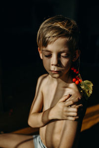 Close-up of shirtless boy