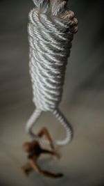 Close-up of rope tied on metal