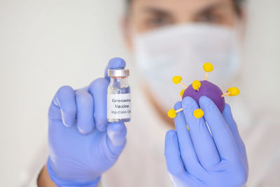 Close-up of human hand holding ring