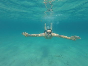 Man swimming in sea