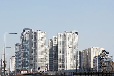 Low angle view of buildings against clear sky