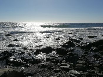 Scenic view of sea against clear sky