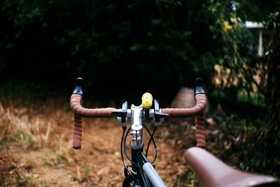 Man riding bicycle on field