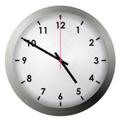 Close-up of clock over white background
