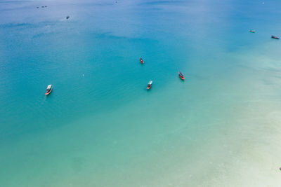 High angle view of people on sea