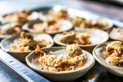 Close-up of food served on table