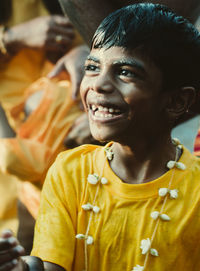 Close-up portrait of smiling young man