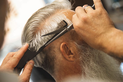 Close-up of senior man looking away